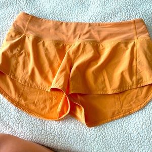Orange lulu lemon speed up shorts 2.5”